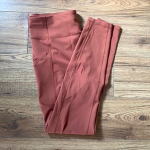 Fast and free lululemon running tight.  Size 10. Length 28.  Ancient copper.